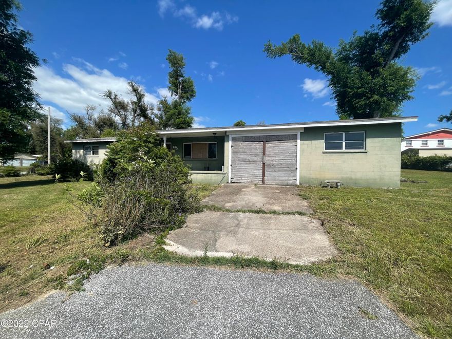 INVESTOR ALERT! Cash only. This 4 bed, 1.5 bath home sits on a half acre corner lot across the street from the bayou! Not in a flood zone! This home was damaged by Hurricane Michael and needs repairs. There is a 1-car garage and a large backyard. This home is located near TAFB, schools, parks, shopping, restaurants and more! Check out the potential in this property today!
