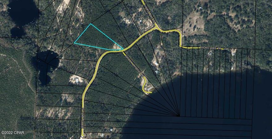 4.55 Acre lot in the community of Hicks Lake. 

Hicks Lake is a spring-fed lake of approximately 300 acres with great fishing and the ability to enjoy life on the water. The public boat ramp is within very close proximity to this lot. The lot features pretty hardwoods and pines with plenty of room to carve out your own oasis. Drive by and take a look any time! Enjoy the country and lake life while still being within a close proximity to Panama City Beach.