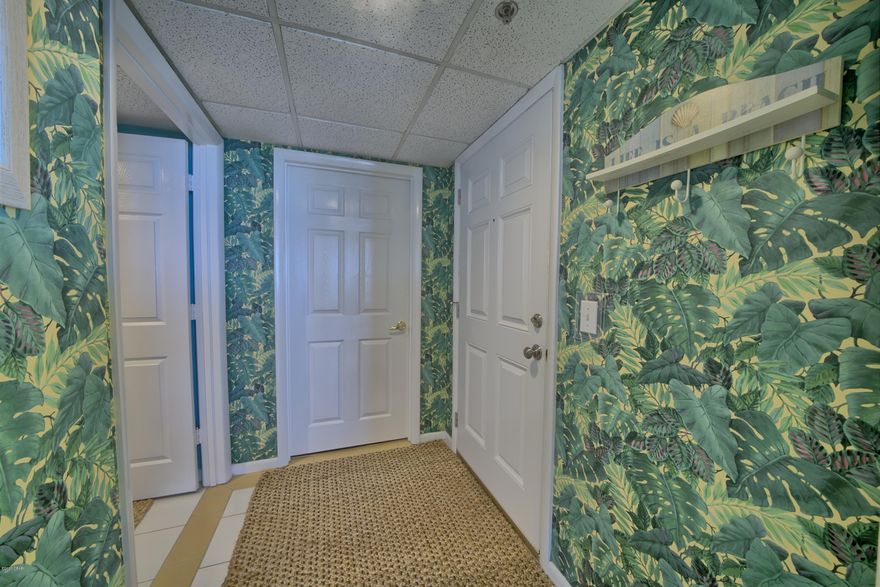 Currently under contract - Seller accepting back up offers.  Immaculate, one-owner condo that has never been on a rental program. Extremely desirable low floor unit which makes for more of a gulf front beach house feel. White sugary sand and emerald water views even from the kitchen in this exceptional 3BR 3BA condominium at popular and historical Long Beach Resort.