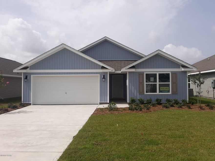 Construction Complete! As you enter this Ryder plan home you will find 8' foot ceilings and vinyl sheet flooring throughout main areas and all bedrooms have plush carpeting. The walls are orange peel texture and have quality paint. Just off the foyer you will find a small hallway that leads to two bedrooms with a shared bathroom that has laminate countertops and vinyl sheet flooring. As you enter the great room you will noticed that the spaciousness as it is open to the kitchen and dining area. With a center island you have plenty of space in the kitchen the appliances include a stove, microwave and dishwasher. There is plenty of living space in this home with just over 2000 SF. Outside you will find a landscaped front lawn and covered patio