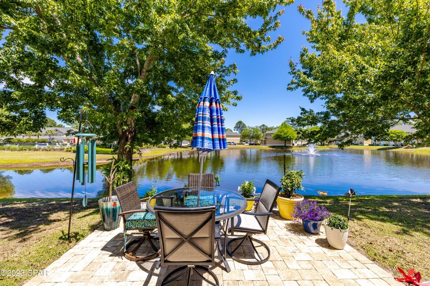 'CURRENTLY UNDER CONTRACT, SELLER WILL CONSIDER BACKUP OFFERS' 
 ~ MOTIVATED SELLER ....  Bring me Offers .... Seller offering $2500 to buy down your Interest Rate... Convenient Location for this 4 Bedroom + 3 Full Baths with a Garage in Annabella's Townhomes. If you are looking for a GATED COMMUNITY located close to THE BEACH, Shopping, Dining, Military Bases, Sports Park, Hathaway Bridge... then grab your Realtor and come check me out! You will love the peacefulness of sitting on your back patio that overlooks the POND. The Downstairs has 9' Ceilings plus a Vaulted Ceiling, Kitchen and Baths have Granite Counter Tops, SMART Thermostat, RING Cameras in Front & Back, and a RING Doorbell. NEW Kitchen Appliances '2023, Storm Door '2022, Washer & Dryer approx. 5 years old, NEW Light Fixtures & Ceiling Fans, Luxury Vinyl Tile, also Tile Plank Flooring, and an Updated Downstairs Bathroom. Do you need a DOWNSTAIRS BEDROOM, I have that too and it overlooks the POND and has it's own Private Bathroom OR you could use it as a Mother-In-Law Suite. The Upstairs has 3 MORE very nice sized Bedrooms. The Back Bedroom ''the Upstairs Master Bedroom'', overlooking the POND, has it's own Private Bathroom too. The Laundry is conveniently located upstairs. It is extremely nice to have a GARAGE, so many places don't, in this area.  It is only a 5 minute drive to the Beautiful WHITE SANDY BEACH. The Community has a POOL, Fitness Center, Club House. The Association maintains the Sprinklers and Lawn, so you can enjoy your time off. The Dues include the Insurance on the Exterior of the Unit, Water & Sewer, Dumpster for Household Garbage, Pool & Sprinkler Maintenance, some Building Maintenance, Roof. Age, SF, and Dimensions are approximate... please verify if important.