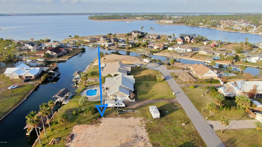 ''CURRENTLY UNDER CONTRACT, SELLER ACCEPTING BACKUP OFFERS'' Navigable WATERFRONT LOT in desired LYNN HAVEN school district. Perfect opportunity for boaters to get on the water with a lift, seawall and infrastructure already in place. Come build the waterfront home of your dreams! A brand new boat lift that can accommodate a 28ft boat was just installed. The canal at high tide is between 5 and 5.5 ft deep.