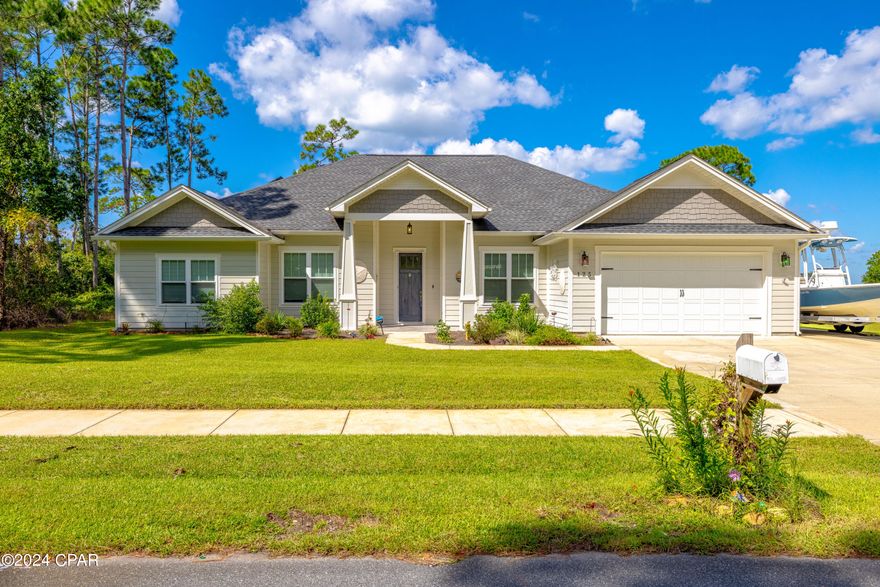 Under Contract - Taking Backups the phrase 'CURRENTLY UNDER CONTRACT, SELLER WILL CONSIDER BACKUP OFFERS' Introducing this stunning custom-built 4-5 bedroom home, proudly situated on a spacious lot in the sought-after Colony Club community. Designed with both style and functionality, this residence features a split bedroom floor plan, an open-concept living and eat-in kitchen area, a separate dining space, and a flexible room that can serve as a 5th bedroom or home office. The master suite includes a luxurious bathroom with a walk-in shower, a garden tub, and a large walk-in closet. With a total of four bedrooms and an office that can easily convert into a fifth, this home is ideal for large or extended families.

Boasting over 2,200 sq. ft. of meticulously maintained living space, this bright and airy home is filled with natural light thanks to its many windows. Outside, you'll find ample parking with an oversized driveway, an additional pad for a boat, jet skis, or an RV, and a double car garage. The home also features 52 solar panels, significantly reducing electricity costs, and includes a transferrable home warranty valid through January 2026.

Located in the unique Colony Club community, known for its proximity to Gayle's Trails, Pier Park, and easy beach access, this home provides an exceptional lifestyle. The Legacy Golf Course, a championship course with a clubhouse and bar & grille, is at the east entrance of the neighborhood. Don't miss this rare opportunity—come see it for yourself!