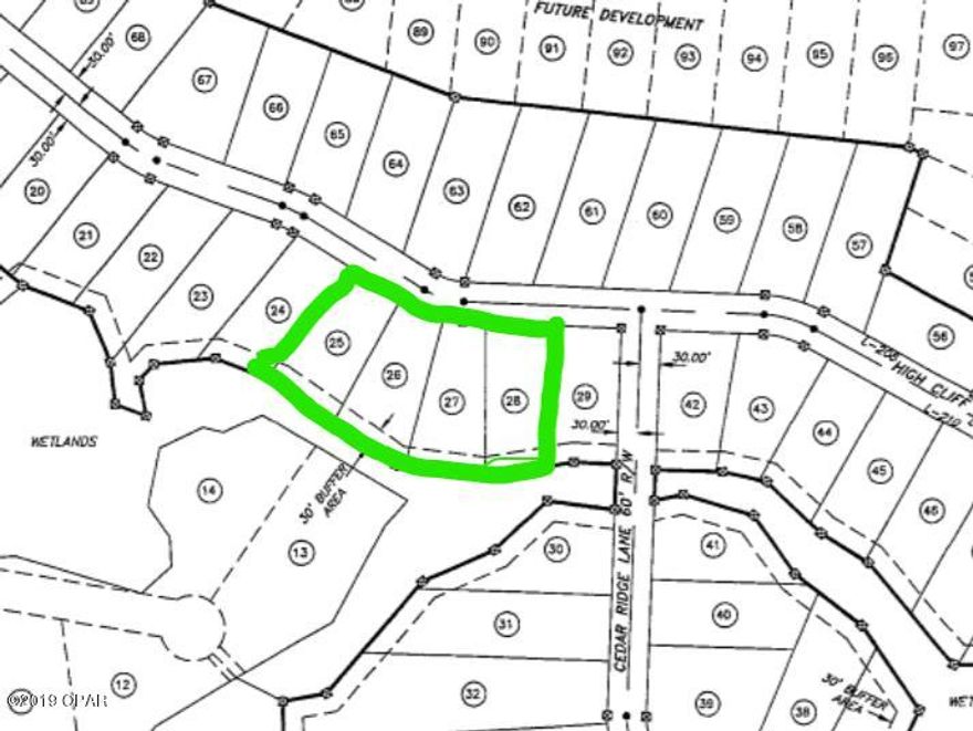 Home site in nice subdivision with some restrictions and covenants, which help hold value over time typically. This upscale community has all UNDERGROUND UTILITIES.  If you want to live in a nice community and among other professionals and families, this is your place, a little country, but close to town/city.  Nice size  1/2acre lots and seller has four congruent lots, willing to separate or sell together in packages of 1,2,3 or all four.  Price for one lot is $35000. There is a retention water area behind lots (dry mostly) labeled as a wet lands jurisdiction by the state, very serene and provides a little buffer area between this property and backyard neighbor.  There are 30' of wetlands inside rear survey boundary line where you cannot build. Feel away from it all, yet so close to town.