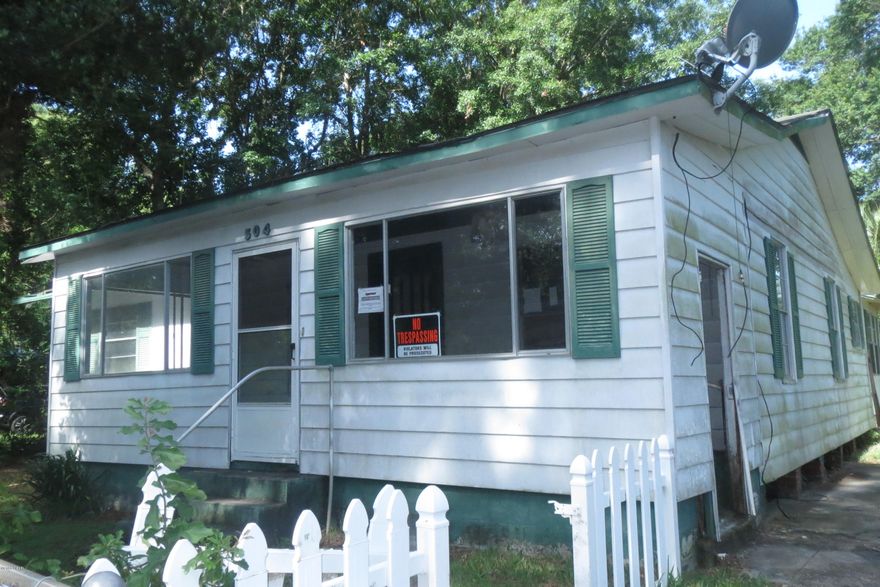 SITUATED ON A LARGE CORNER LOT, this home could be a perfect rehab for the right homeowner, or you may be able to put one home each on a 75' lot if you front 5th St.  In the heart of Lynn Haven, this property has loads of possibilities!