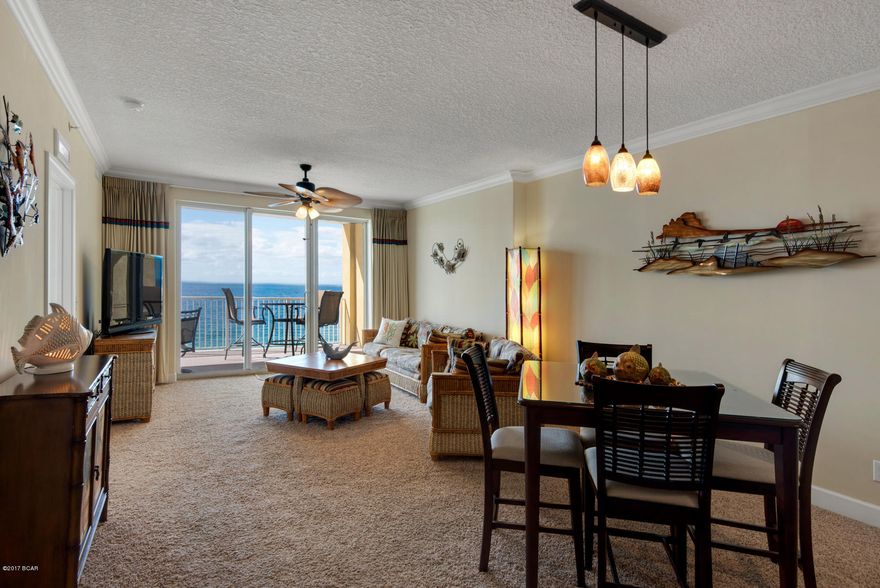 ** 2BR/2BA | NON-RENTAL | END UNIT | GREAT CONDITION **

As a  NON-RENTAL, this unit has been very well kept. The kitchen cabinetry is in great condition and has space above, making the room feel larger. The granite countertops, tiled floors, and modern lighting fixtures make the kitchen feel like new!

With the tastefully decorated beach theme throughout, and the fresh paint, this unit has the warm and inviting get-away atmosphere you're looking for.

This unit has a split floor plan separating the two bedrooms within the unit. The hall bathroom is quite large and has extra space for storage.  

The living room has a large flat-screen TV, but you may choose to watch the waves instead with the incredible view from the balcony. This 2BR | 2BA end unit features an extensive L-shaped balcony that overlooks the Gulf and all its beauty.
The GULF-FRONT master bedroom has a large mounted TV, an incredible view and access to the balcony as well. 
Tropic Winds has 22 floors of luxury units that overlook the beautiful Gulf of Mexico. Just two miles from Pier Park, Tropic Winds is in a fantastic location on the west end of the beach between Pier Park and 30-A.