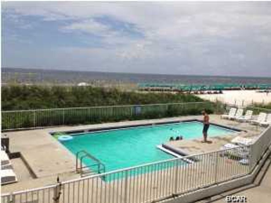 Wow! One of the best entry level opportunities to get your feet in the sand right on Panama City Beach! Across from one of the best oyster bars on the beach and down the street from Pier Park, you can walk to just about anything you need! This unit is actually two units that can also be used as one large one. So much space! Large open living room and kitchen and a flex space that can be used as an extra sleeping area, plus 3 bedrooms! Two bedrooms and two baths downstairs plus a bedroom upstairs. Added features include very high ceilings and a fireplace in the living room. Don't miss out on this one!