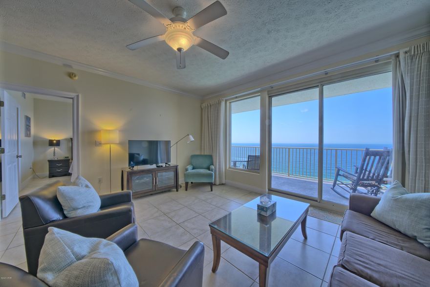 Perhaps one of the best views on the beach from this 21st floor unit. From the spacious balcony you can see the entire beach. When you walk out the street side door you have a great view of the Lagoon and Bay. The complex is well managed with some of the lowest HOA fees on the beach. In walking distance to fine restaurants and beach clubs. The unit comes fully furnished and is move in ready. The unit is expertly decorated and has tile flooring in every room.. The unit is also near the St Andrews State Park. All information is believed to be correct but should be verified by the Buyer.