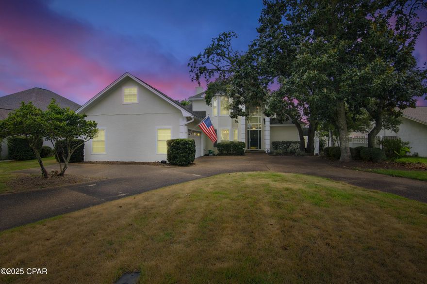 Stately Bay Point pool home with screened lanai on quiet cul-de-sac! 2,800 + sq. ft.  with side entry garage and golf cart parking as well as  circular driveway and Generac Generator! Totally remodeled and updated including kitchen and all baths!  This spacious home offers lots of storage and natural light with an open floorplan.  Beautifully updated kitchen with granite/stainless/coffee bar, double ovens and lots of cabinetry.  Living area overlooks pool with woodburning fireplace and separate dining room.  Kitchen nook for dining area that opens to family room and wetbar offering sink and fridge.  Master bedroom downstairs off living room overlooks pool too!  All tile laid on diagonal downstairs for easy maintenance with master bedroom offering beautiful hardwoods.  Master bath has garden tub and separate shower plus large walk-in closet with door to pool.  Upstairs you'll find two spacious bedrooms, guest bath and bonus room over the garage.  Bay Point offers a marina, dining, championship golf, gated entry with 24-hour security  and is conveniently located close to Grand Lagoon, waterfront dining, Shell Island and award-winning waterfront restaurants.