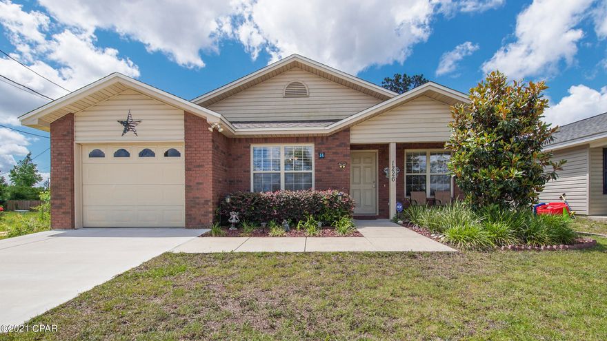 CURRENTLY UNDER CONTRACT, SELLER ACCEPTING BACKUP OFFERS  Country quiet but just minutes to town!  This lovely, well kept and beautifully landscaped one owner home is less than 5 miles to Lynn Haven's shopping and restaurants and less than 30 minutes to Tyndall AFB and Naval Coastal Systems.   Inside details include crown molding, tray ceilings, chair railing and oversized windows in living/dining area for lots of Florida sunshine natural lighting.  Galley kitchen means everything is easily accessible with ample storage space and an ''all gather around'' good size breakfast bar!  Home is all electric with new roof in 2018, sprinkler system, outdoor storage shed and some new privacy fencing.  Two covered porches  - one out front to enjoy the lovely flowers in your front yard  or the very p This home is close to fishing spots, schools, and several parks including parks with public boat ramps.
This home isn't going to last so call your REALTOR today to schedule your own private showing before it's gone!