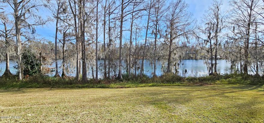 Here is your Opportunity to own this custom built 3 Bedroom 4 Bath Home with 200' of WATERFTONT Property on Merritts Mill Pond in Marianna Florida. This home was built with your family in mind! Each of the bedrooms are very large and also have their own personal bathrooms. The largest of the bedrooms as 2 walk in closets, and a sitting room! The living room is 20x30 and overlooks the water and has a beautiful built in cabinet and fireplace. The large kitchen has plenty of countertop and cabinet space! There is a large family/bonus room which the kids will love!!! All of this sits on 2.30 acres, and the view is spectacular! This home is Priced to sell so call today for your personal showing!!