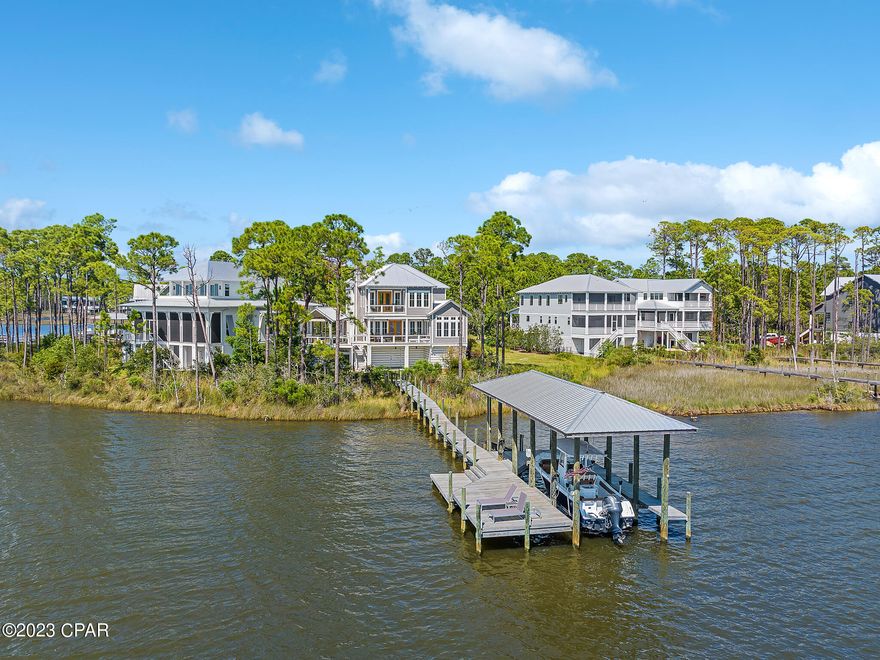 Exquisitely furnished, turn key opportunity! Welcome to Sunset Point at 55 Teal Ct, a rare south & west facing bayfront property w/ breathtaking views of Choctawatchee Bay. The positioning of this custom-built home by Grand Bay Construction is designed to maximize unobstructed sunset vistas over converging marshes, pine trees, & wetlands. Every aspect of Sunset Point was thoughtfully planned. Custom finishes include reclaimed wood beams, white oak hardwood floors, Venetian plaster fireplace & smart home features like mesh wireless network & a Marantz multi-zone whole home stereo system, & more. The professionally decorated interior boasts large living spaces with expansive windows, custom window treatments & high end furnishings. THIS PROPERTY IS BEING OFFERED FOR SALE, FULLY FURNISHED.