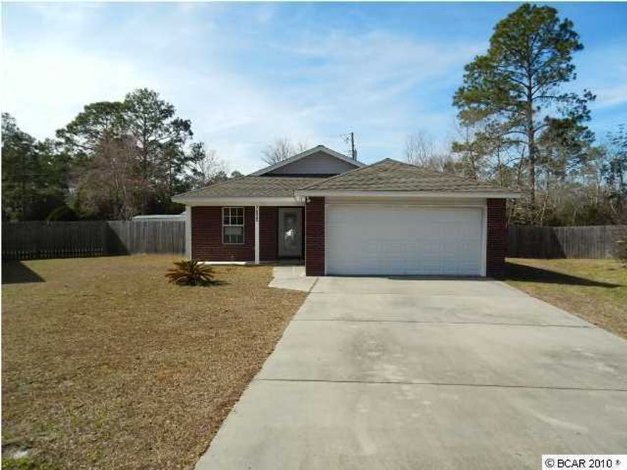 Traditional, brick face home on neatly manicured lot w/fully privacy fenced backyard and functional and open floor plan that features vaulted ceilings, great room, eat-in kitchen w/closet pantry, pretty white cabinets, and breakfast bar, split planned bedrooms w/two-panel doors w/brushed nickel fixtures, and a master suite w/super nice master bathroom w/dual sinks! Located off of Transmitter Rd, this home offers excellent proximity to the downtown Panama City area, Lynn Haven, and Youngstown! EQUAL HOUSING OPPORTUNITY.