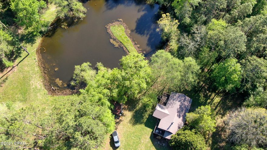 CURRENTLY UNDER CONTRACT, SELLER ACCEPTING BACKUP OFFERS! Secluded Getaway! Beautiful 85+/- Acre recreation tract in Northwest Holmes County. This tract boasts multiple ponds, mixed woodland, open fields, and natural water features that make this piece a Sportsmen's paradise! This property is absolutely teeming with wildlife from Deer, hog, and Turkey, as well as ponds full of fish. The property also features a Quaint 2 Bedroom 1 Bath Home with hardwood floors, and tongue and groove ceilings. Outside, the home features covered and open decks, and overlooks one of the various ponds on the property. It also comes equipped with a workshop and an additional yard building. You have to see this property to truly appreciate. Schedule your showing today!