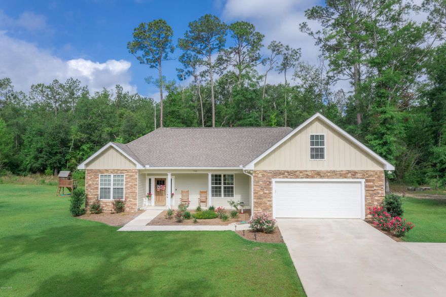 Beautiful Custom Built Home...tucked away on quiet street just minutes from downtown. 4 Bedroom 3 full bath with open concept. Granite countertops, stainless steel appliances, abundance of cabinets and large island overlooking living space. Master bedroom with whirlpool tub and separate shower. 4th bedroom and bath upstairs, rest of bedrooms downstairs. Additional lot included with pole barn.