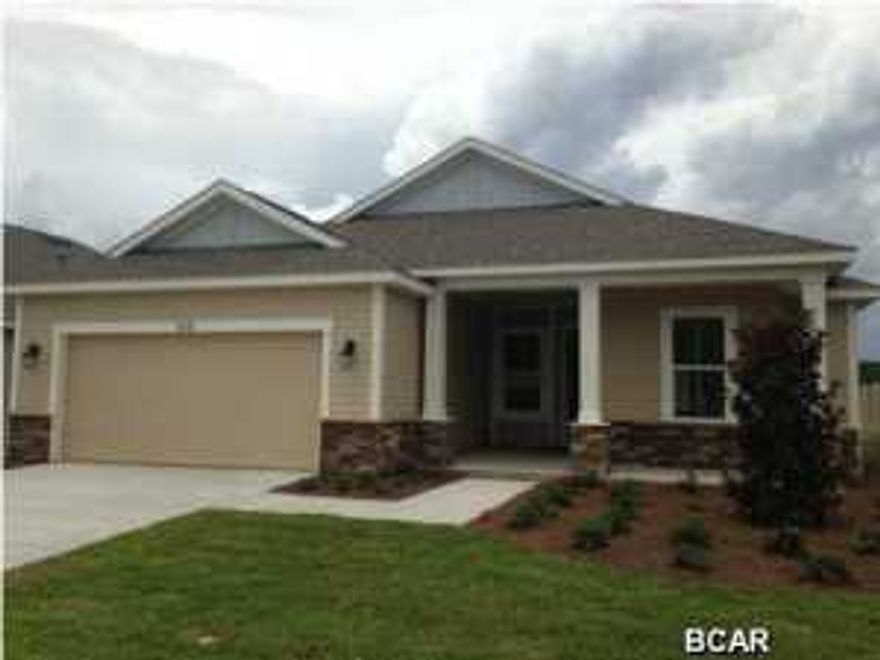 Beautiful new construction home in new Whisper Dunes Phase 2B subdivision. This home will feature a Pompano I floor plan, with a Carolina elevation. A Samuel Taylor built home includes standard features such as designer carpet in main areas and bedrooms, 8 ft. 2 panel craftsman interior door package, brushed nickel fixtures and faucets throughout, insulated (R19) interior common walls and insulated (R38) ceilings, and durable Sherwin Williams premium interior wall paint. Kitchen features stainless steel appliance package (range, dishwasher, & microwave) and oversized 36'' wood cabinetry with crown molding, and granite counter tops. Full bathrooms include raised vanity heights, large tile flooring in bathrooms and laundry rooms, 2 x 6 Exterior Wall Construction, and hurricane tie down