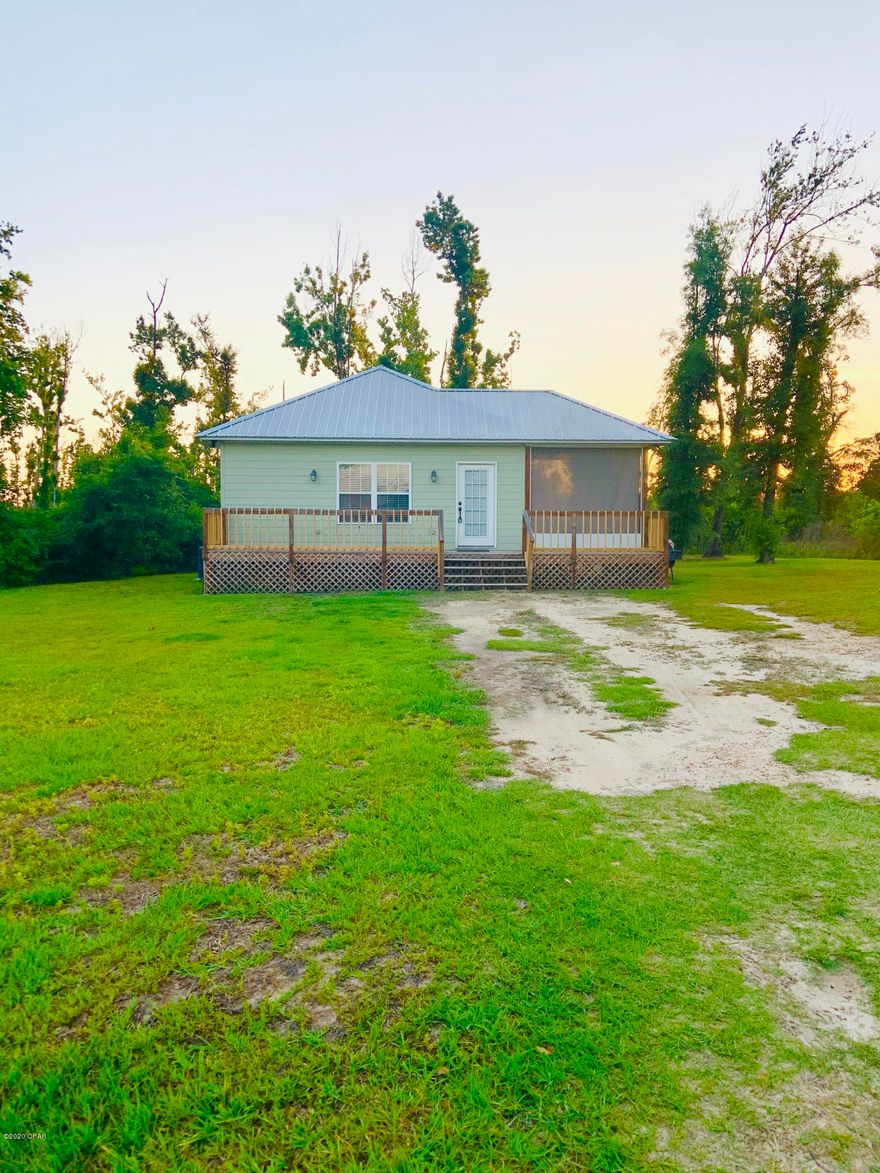 This cute well kept 2 bedroom 2 bath home in Altha  is located within minutes of the Chipola river, less than 25 minutes to Marianna, and under a hour to Panama City! Home boast ceramic tile floor throughout home,  granite counter tops, an on demand hot water heater, as well as, being tightly insulated with spray foam insulation making for awesome energy efficiency! Side porch is screened in with aluminum screen making for wonderful evening outside after the work day is done. call for showing appointment today!