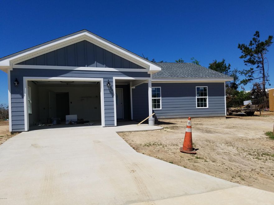 NEW CONSTRUCTION! This home is made for You!  Stainless appliances, marble counter tops, garage and patio!  This home is energy efficient and has county water and sewer.  Survey and Builders 1 Yr Warranty are provided.