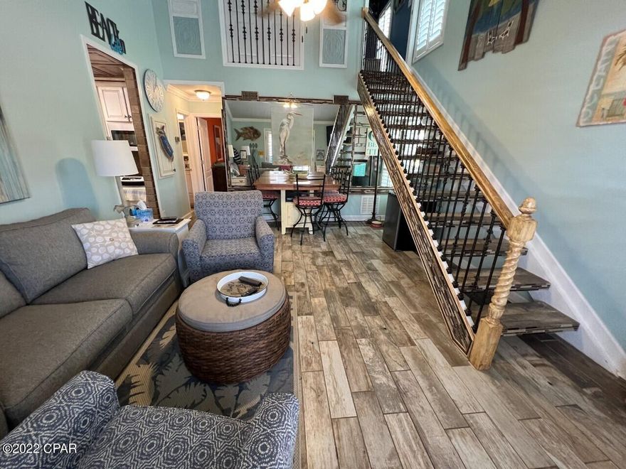 WOWZA!! Huge Rental Potential!!  Beach condo with so many UPGRADES (TOO MANY TO LIST), amenities & short stroll to the beach!! Just check out the photos!!  There is no carpet in the unit (all beautiful tile flooring), and both full bathrooms have walk-in showers with a built-in seat.  Hurricane Impact windows installed in 2022 & new roof in 2019.  Plantation shutters are icing on the cake!  In addition, there is a TV hook-up on the enclosed porch with new flooring as well.  Horizon South has SO many amenities including: 4 pools (plus a baby pool), hot tub, 18 hole mini golf course,  tennis courts, basketball, shuffle board, fitness center, game room, & more.  **Measurements are approx. and should be verified**