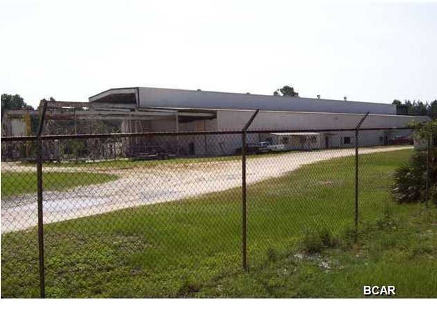 This outstanding site is zoned heavy Industrial and encompasses ten (10) acres with less than 1 acre segregated as jurisdictional wetlands. Approximately seven (7) acres are fenced. The main building has 19,625 square feet under roof and offers three overhead cranes which allow for approximately twenty-four (24) feet of hook height. The main crane way is 45 feet by 240 feet under roof with an additional 120 feet of crane way outside. The building has 3-phase, 800 amp power. A rail siding is also adjacent to the site. A second building serves as an office and includes approximately 1641 square feet of heated and cooled space. The somewhat secluded, but very accessible location is ideal for almost any industrial purpose.