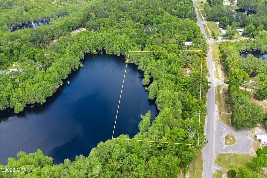 WATERFRONT PROPERTY! This rare find will make a great place to build your dream home, a weekend getaway or use as an investment opportunity! Property consists of 5.35+/- acres and just a short drive from Interstate 10. **Property is being sold ''as-is'', there are 2 mobile homes located on the property which are of no value.**