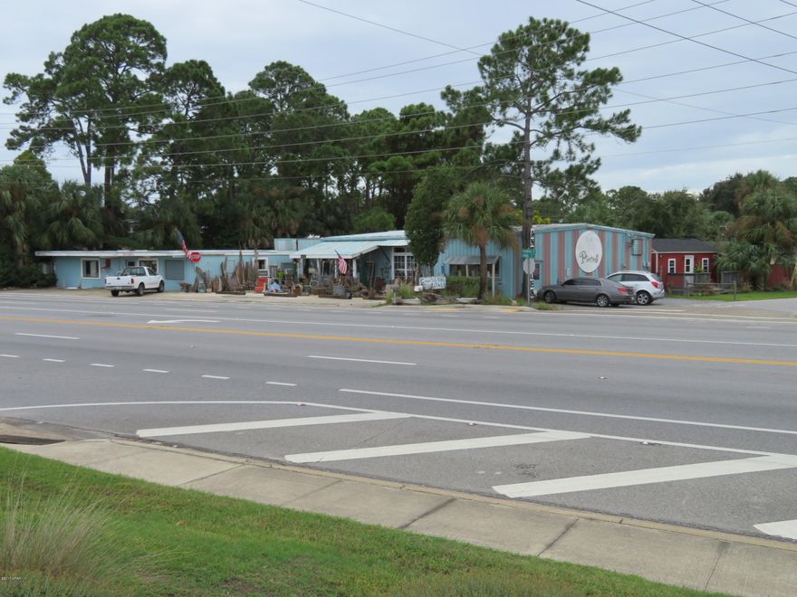 Great commercial opportunity & location near the Thomas Drive & Magnolia Beach Road intersection one of the busiest intersections on the east side of Panama City Beach, the gateway to the Bay Point Community. Site is located directly across Thomas Drive from Magnolia Plaza anchored by Publix and Wells Fargo Bank and zoned General Commercial (C-3) in unincorporated Bay County. The building is over 7,000 square feet of retail and living space currently occuppied by ''Pieces On The Beach Marketplace''. Great visibilty and easy access with 27,000 vehicles per day (2016 FDOT) passing by this location. Convenient access and parking from 3 sides, including a county owned alleyway in the rear.  Great site with many possibilities for an investor or end user.