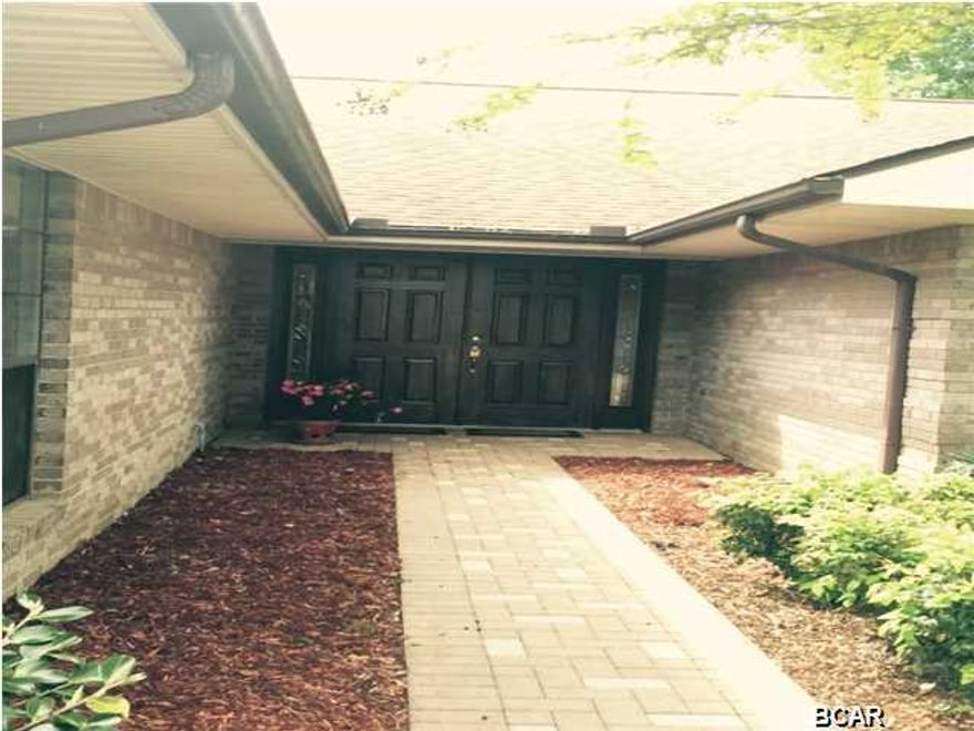 Gorgeous canal home in North Harbour subdivision. The owner has freshly painted the home along with some faux finishes in the master bath and an accent wall in the great room. The open and airy floor plan and pool porch along with the beautiful screened room, make this a fabulous home to entertain in or just enjoy yourself. The pool is solar heated for winter enjoyment and the yard is fenced in for privacy. There are beautiful wood floors and imported tile throughout. The kitchen features a new backsplash and corian countertops for low maintenance. There is an oversized master suite with a sitting room, a great retreat suite. The oversized garage has a work bench with pull down stairs for lots of storage in the attic. Some of the upgrades in the home include dimmer switches that