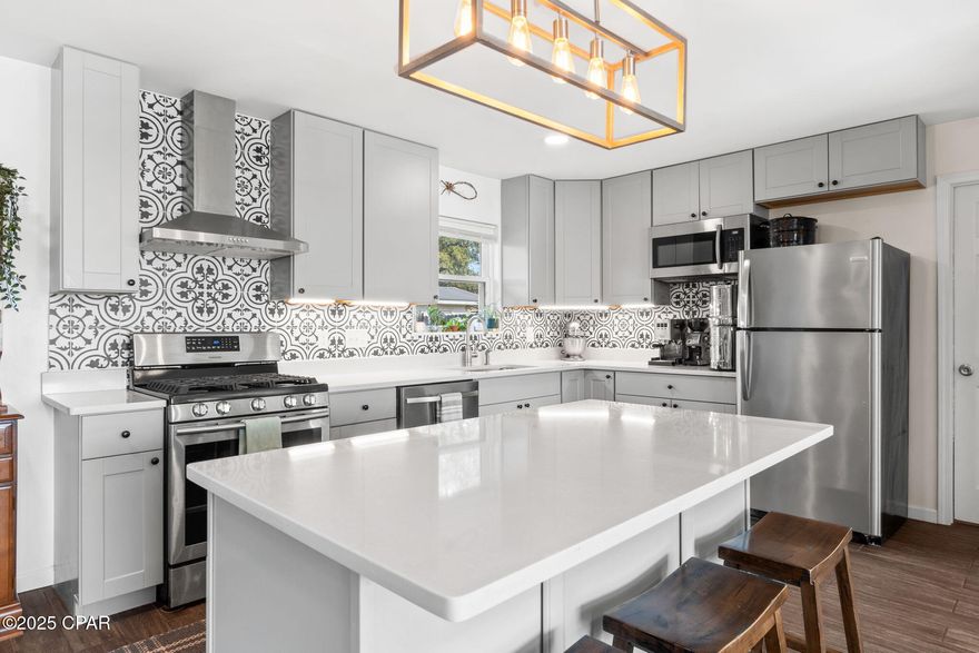 Welcome to 212 S Kimbrel Ave, a beautifully updated 3-bedroom, 2-bath home offering the perfect blend of style and comfort in a quiet, established neighborhood. Step inside to find a bright and open living area filled with natural light, flowing seamlessly into a stunning modern kitchen featuring a large center island, quartz countertops, stainless steel appliances, and a designer tile backsplash. A bonus room off the main living space provides flexibility for a home office, playroom, or cozy reading nook. Recent updates include a new dishwasher (2025), kitchen sink and disposal (2023), and HVAC and water heater (2019), ensuring peace of mind for years to come. Outside, the fenced backyard offers plenty of space for kids, pets, and entertaining, complete with a wooden deck and storage shed. Move-in ready and just a short drive to schools, shopping, dining, and the beach, this home has everything you need to enjoy Panama City living at its best!