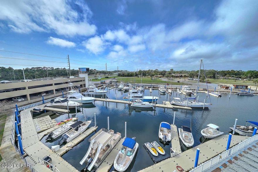 Look no further, this is the full time residence or second home you've always dreamed of... professionally decorated and without a doubt the very best views at Marina Landing! provides every thing you've ever dreamed of. Marina Landing features floor to ceiling views of the pristine St. Andrews Bay from every room and the expansive balcony features a stainless outdoor kitchen that provides you with a true outdoor living space that is perfect for entertaining family and friends. The redesigned kitchen is brand new from the floors up! It offers an abundance of cabinetry, new granite throughout, decorator designed breakfast bar, new stainless steel appliances and full pantry. The Master Bedroom Suite comes with full walk-in closet, luxury master bath with separate shower and extra deep soaking tub great for those bubble baths! This spectacular property has a private deep water marina onsite and is just minutes to  the pass...a boat owners dream come true. Marina Landing also features a beautiful bay front pool and hot tub with tropical landscaping, quiet sitting areas, conference room, and health & fitness center. Just minutes to the white sandy beaches and right down the street from Pier Park, this spectacular property provides both the perfect location and the perfect lifestyle... If you are looking for the perfect place, you owe it to your self to take a look, this one will not last long!