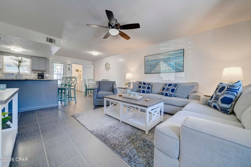 Discover your dream escape in this enchanting 2-bedroom, 1.5-bath townhome, nestled in the heart of Gulf Highlands Beach Resort. This perfect blend of comfort and elegance makes it an ideal primary residence or vacation home. It's also an excellent investment opportunity for savvy investors with a proven rental history and excellent online reviews. This turn-key property is ready to generate income for you immediately while allowing you to experience the best of coastal living.
Step inside to find a fully furnished, immaculate two-bedroom, one and a half-bathroom, updated townhome tastefully decorated with a coastal theme. The property is being sold turnkey with a 2023 MakDaddy Legend golf cart. Since 2024, the home has undergone several updates, including a new roof, leathered granite countertops in the kitchen and both bathrooms, a custom tiled shower, textured and painted bathrooms, updated lighting, LVP stairs, fresh paint throughout, a new stove and washing machine, front and back screened doors, interior doors, a privacy-fenced yard, new furnishings, TVs, and coastal décor, all meticulously selected for quality and style.
No more long waits for elevators! Park in your two dedicated parking spaces right in front of your condo for easy loading and unloading. Enjoy Gulf Front dining and drinks at The Beach House Restaurant of Gulf Highlands or simply relax in your fenced back patio, perfect for grilling after a day at the beach.
Gulf Highlands Beach Resort is a golf cart-friendly, gated community located in the heart of Panama City Beach. It's close to restaurants, shopping, and the world's most beautiful beaches. The resort offers a wide range of amenities, including 11 saltwater swimming pools (5 seasonally heated and one Gulf Front), dedicated beach access, pickleball courts, tennis courts, shuffleboard courts, an 18-hole miniature golf course, a fitness center, and a community clubhouse. Embrace a laid-back beach lifestyle in this unbeatable location, close to world-class attractions, shopping, restaurants, and it's just steps from the sandy beach and sparkling waters of the Gulf. This charming property boasts a beautiful interior and proven rental potential, making it a must-see. Don't miss out on this opportunity to make it your perfect beach retreat! All information is approximate and should be verified by the buyer if important.