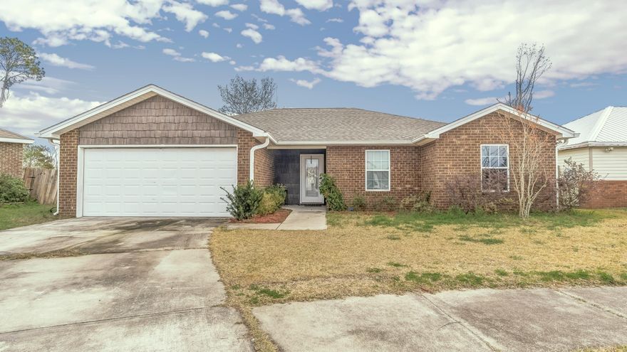 4 BEDROOM / 2 BATH HOME IN LYNN HAVEN – NEW ROOF!  Built in 2012, this newer home features a mostly open floorplan with split bedrooms, new flooring in the living room, an attractive kitchen, a 2 car garage and an interior laundry room.  The living room has a decorative step ceiling with crown molding and is open to the dining area and kitchen.  The kitchen has stainless steel appliances, large tile flooring, a pantry and a breakfast bar. The master bedroom has a walk-in closet and adjoining master bathroom.  The other bedrooms are good size and share a hall bath.  The backyard is newly fenced with a back 8FT privacy fence and has a covered porch.  This home is located at the end of a cul-de-sac in a sidewalk neighborhood.  Great school zones!  Call today for your own private preview. All information derived from seller and public record; buyer to verify. Measurements approximate.