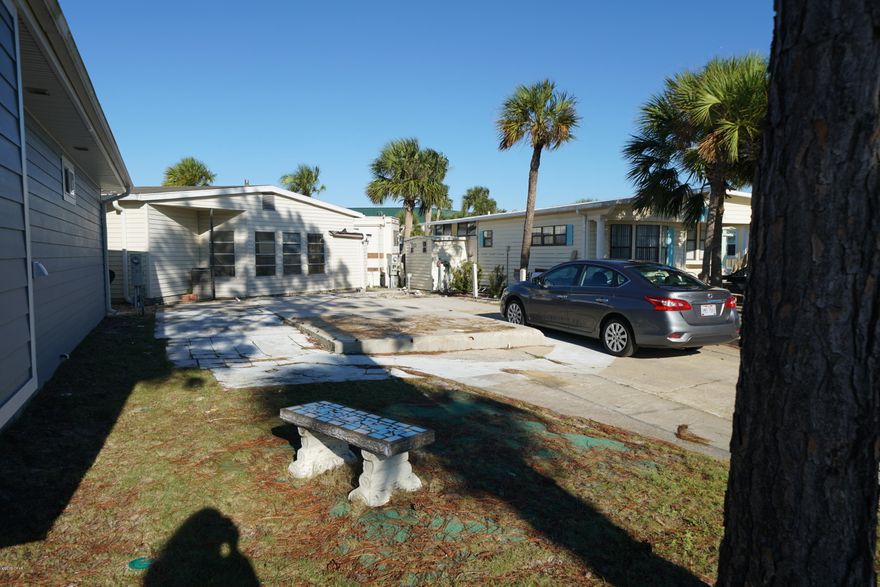 Check out this beautiful lot in highly sought after Venture Out. Great central location within the resort.  Build your dream home or bring your RV. This one won't last long! Venture Out offers BOTH beach and bay access! The resort also has 2 pools, tennis, golf, shuffleboard, playground, basketball, fishing pier, boat dock with slips & boat ramp. Venture Out is a golf cart community that has exploded in popularity within the last few years. A gated, pet friendly community that's great for full time residency or just to vacation. 24 hour security & friendly atmosphere. It's all here!