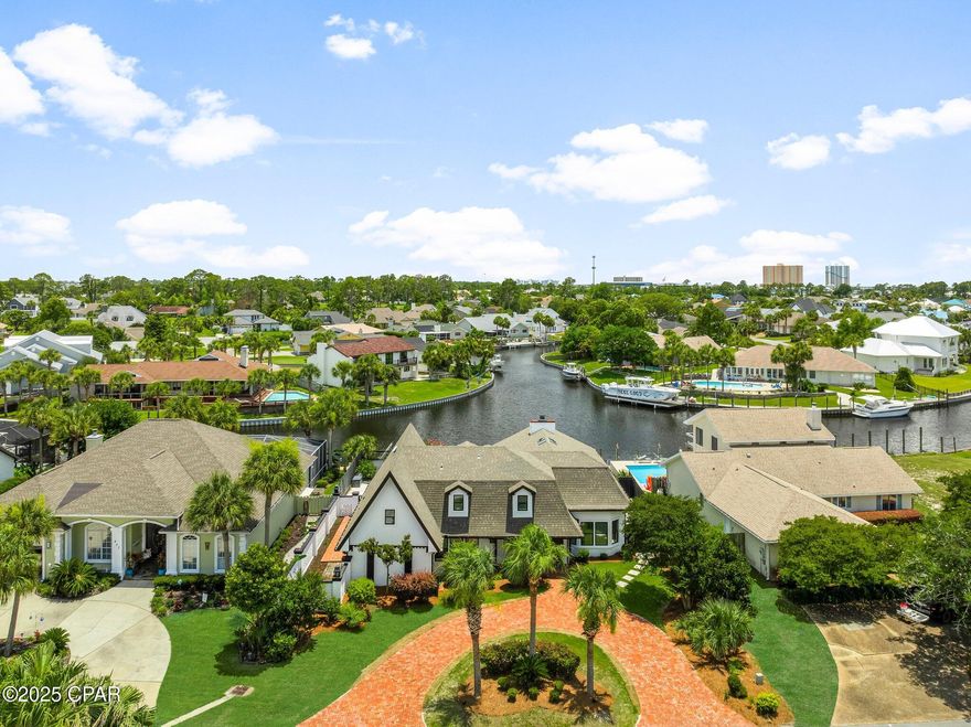 Stunning Waterfront home in Bay Point - A Boater's Dream!

This breathtaking 3189 sq ft waterfront home in the prestigious Bay Point community, offering 4 spacious bedrooms, 3 beautifully updated bathrooms, and a flexible bonus/game room that opens to a private balcony with panoramic water views.

Perfectly situated at a wide intersection of the canal with approximately 78 feet of water frontage, this home is ideal for large vessels and boating enthusiasts. Enjoy direct water access, a small boat lift, and a paver side yard perfect for additional storage.

Inside, you'll find a grand open-concept living space with vaulted ceilings, floor-to-ceiling custom windows, and a cozy fireplace, all designed to highlight the one-of-a-kind views and flood the home with natural light. The renovated kitchen is a chef's delight, featuring quartz countertops, stainless steel appliances, and a large breakfast bar perfect for entertaining.

The luxurious primary suite offers serene water views, a walk-in closet, and an updated ensuite bathroom with a double vanity, walk-in shower, and soaking tub. With two bedrooms upstairs and two downstairs, this layout provides comfort and privacy for the entire family.

Step outside to your private pool, expansive deck, and beautifully landscaped surroundings. Additional features include a U-shaped driveway, updated flooring throughout, and a large attic space for extra storage.

When you purchase in Bay Point you're not just purchasing a waterfront home. Bay Point is known for its pro golf course the Nicolas course, its newly renovated Marina, annual events such as Bill Fish and so much more. 

Whether you're seeking a peaceful getaway or an entertainer's paradise, this waterfront gem delivers coastal living at its finest.