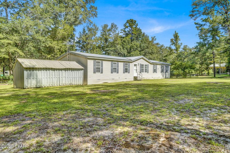 Step into your own peaceful retreat in the heart of Ponce de Leon! This spacious 4-bedroom, 2-bath home offers a perfect blend of comfort and charm, nestled on a quiet street and set on an expansive 3.93-acre lot surrounded by natural beauty. With ample room both inside and out to relax and entertain, it's an ideal setting for everyday living and weekend escapes.

Enjoy easy access to nearby natural springs, parks, and waterways—perfect for outdoor enthusiasts who love swimming, kayaking, fishing, and exploring the great outdoors. The generous acreage provides plenty of space for gardening, outdoor activities, or even future expansion.

Local schools, dining, and convenient access to I-10 are just a short drive away, offering a wonderful balance of tranquility and everyday convenience.

Don't wait—make this inviting home yours and start living the laid-back Florida lifestyle you've been dreaming of!