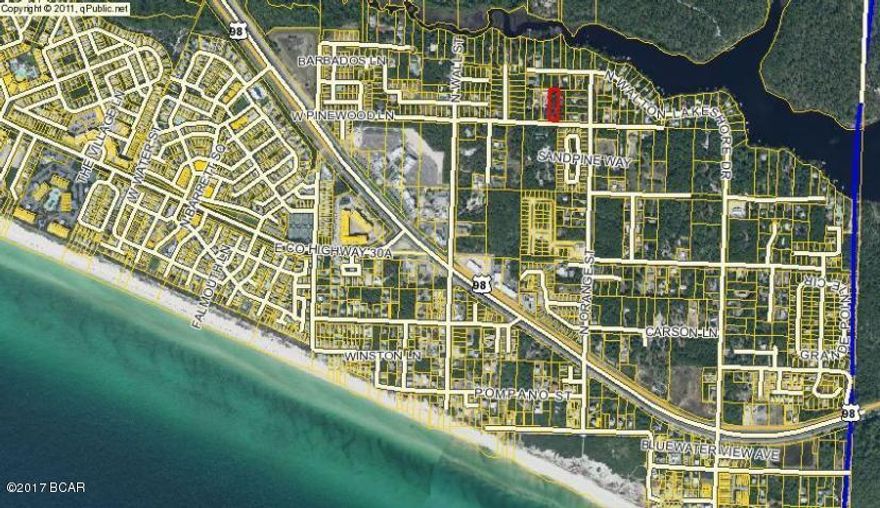 Over a 1/2 acre in BOOMING INLET BEACH, located next to Rosemary Beach/30A to the West, Lake Powell to the East.  Upscale shopping and restaurants, Public Beaches with facilities and 3 boardwalks to the South....all within walking distance!!  Just 10 minutes to Pier Park and 25 minutes to the Panama City Beach Airport.