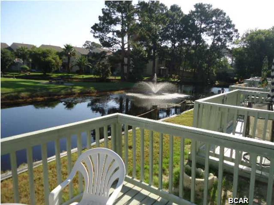 Age, SF, and dimensions approximate. Very nice furnished ''Glassback'' unit on the canal. Go to the clubhouse with a pool on the beach or fish off your back deck. Complex is gated and pet friendly. Enjoy one of the 11 pools or a round of mini-golf.