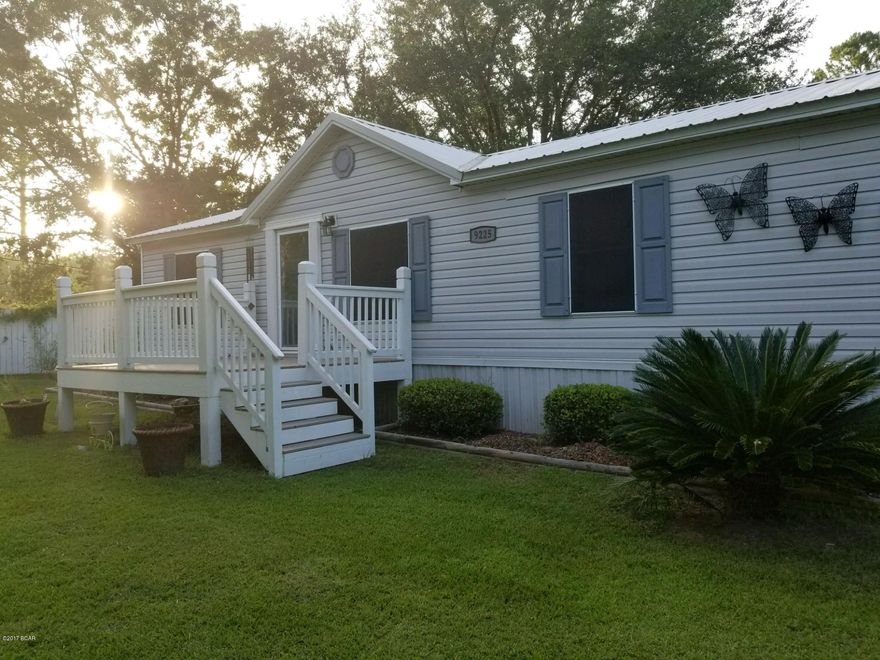 Beautiful ready to move in home on over half acre chain linked fencing with back yard with privacy fencing. Home features split bedroom plan with 3 bedroom, 2 baths, living room, den, laundry room, new stainless appliances, Metal roof less than 3 years old, solar screens on windows, and upgraded fixtures throughout home. Must see to appreciate. Call for your private showing appointment today.