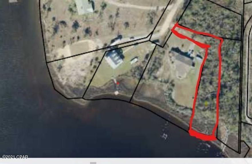 WATERFRONT---GREAT AREA TO BUILD YOUR DREAM HOME!!//// .69 ACRES ON DEEP BAYOU THAT LEADS TO THE GULF OF MEXICO!!!! Borders the East Bay Subdivison that now has all utilities --elec, water, and sewer.  Buy must obtain utilities!  Parcel is large enough for well and septic tank//// property has dock permits---docks have been built but damaged with Hurricane Michael.///

Great price with the outstanding potential with awsome sunsets on Beautiful East Bay.

Near Tyndall AFB--and Eastern Ship yard!!!!