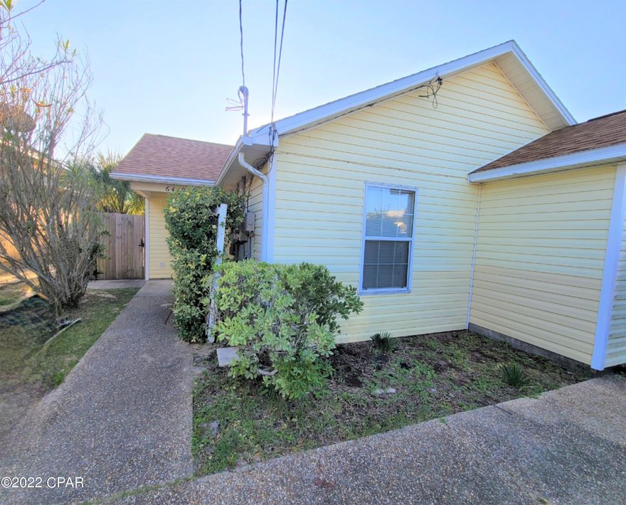 Newly Painted 2-bedroom, 2 bath duplex with covered patio and privacy fenced backyard.  This home features an open living area with eat in kitchen and breakfast bar. tile floors throughout, split floor plan with each bedroom having its own bathroom.  Property is all electric and is on septic tank and PCB water.  Includes stackable washer/dryer and shrub trimming quarterly.

1 small dog under 20 lbs.

$50 Pet Fee, $250 Pet Deposit and $25 per month pet rent.