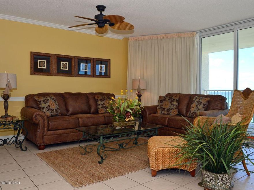 Fantastic 3 bedroom/3 bath Tower 3 unit on a lower floor.  This unit features floor-to-ceiling windows in all rooms with direct views of the beach and the Gulf of Mexico.  Each bedroom has a private bathroom with a double vanity and oversized garden tub.  The light and bright kitchen is fully equipped and has a breakfast bar to seat three.  The unit has new living and dining furnishings, bedding, wall art and decorative items as well as a new full size washer and dryer.  A unique feature of this 3 bedroom unit is that one of the bedrooms has a private balcony and efficiency kitchen which could be utilized as a separate lock-out unit.  Other amenities and features of this unit:  Tower 3 overlooks the lagoon pool; there are two additional pools in the complex; 24-hour gated security; parking is in front of the building.  Long Beach Resort is conveniently located at the beginning of the Miracle Strip with shopping, dining and entertainment just minutes away.   Some furnishings/decor are excluded from sale.  See agent for list of excluded items.