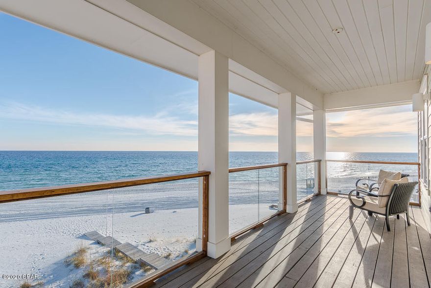 ''Coastal Living'' offers spectacular views of the Gulf of Mexico.  Step out your back door onto the sugar white sands of the most beautiful beaches in the world! Located on the highly sought after West End of Panama City Beach, this 3300 sq. ft. beachfront home sleeps up to 16 guests. As you enter the home on the 1st floor, you will notice an additional refrigerator and a half bathroom, with a door leading to the outside pool area with plenty of space for lounging.  Head up to the 2nd floor and enjoy Coastal Living's great open floor plan. The spacious kitchen, dining area, and living room provide a great spot for guests to gather. There is a Murphy Bed in the living area as well as a Flat Screen TV and access to a balcony overlooking Panama City Beach. Down the hall you will find a half bathroom and a King sized bedroom with en-suite and flat screen TV. On the top floor, there is a Queen sized bedroom on the street side, with en-suite and flat screen TV. There is also 2 Queen over Queen bunk bedrooms, one with a connected bathroom. There is an additional full hall bathroom as well as a full washer/dryer. On the south end of the home, one can find the luxurious master suite. This room features a King sized bed, flat screen TV, spacious bathroom, and direct access to a furnished balcony overlooking the water.
The glass balconies in this home will allow you to watch the sunset and enjoy the views to the fullest.  Come see what true "Coastal Living" is all about!