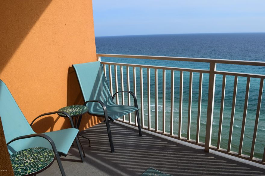 Splash, the spectacular family friendly condominium located on the desirable and quieter west end of the beach! Stunning Gulf views abound from the spacious living and kitchen area! The kitchen and bathrooms have granite counter tops. All the flooring has been updated to graphite colored plank tile.  The unit was also freshly painted a graphite color with white trim. The air conditioner is about 5 years new, the fridge about 2 years new. The unit is equipped with a full size front load washer and dryer.