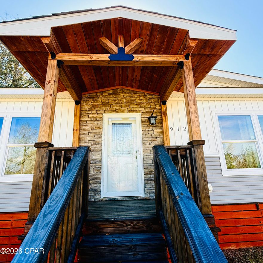 Welcome to this spacious 3-bedroom, 2-bath manufactured home offering 1,920 square feet of comfortable living space on a large lot convenient to all the action Panama City has to offer. From the moment you arrive, the welcoming stacked stone entry adds charm and curb appeal.

Inside, the home features a thoughtfully designed open concept living area centered around a beautiful stacked stone entertainment wall with wood accent, floating shelves, and an electric fireplace, creating a warm and inviting focal point for relaxing or entertaining.

The large kitchen and open living space provide plenty of room for gatherings, while the generous lot offers endless possibilities--add a pool, build a storage building, or create your dream outdoor space.

The primary suite offers a large soaker tub, tiled walk-in shower, and a seperate master closet. Each additional bedroom also features its own walk-in closet, providing ample storage throughout the home.

As an added bonus, the seller is offering a $2,000 allowance toward the purchase of a refrigerator, giving buyers the opportunity to choose the model that best suits their needs.

Don't miss the chance to own this spacious home with desirable features and room to grow in Panama City!