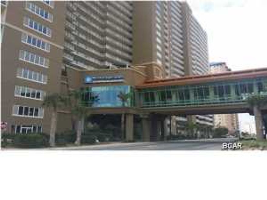 Perfect second floor location with a beautiful view of the gulf and the swimming pool. This is a great two-bedroom, two bath unit that also has a bunk area! It is located in Emerald Beach, a project in Panama City Beach that is full of amenities and provides high-end concierge service. Make an appointment today to see this beautiful unit! (Dimensions and square footage are approximate. Buyer must verify if important.)