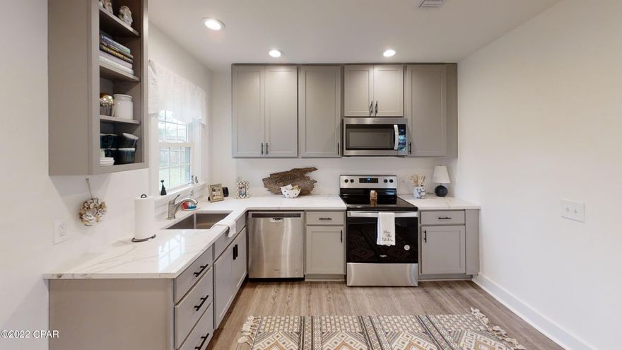 CURRENTLY UNDER CONTRACT, SELLER WILL CONSIDER BACKUP OFFERS: Cute Cove Ranch - The home was fully remodeled in 2021/2022 including: new electrical, new plumbing, new insulation (with foam insulation in the attic), new sheetrock, new HVAC system, new water heater.  The kitchen has custom  Thomasville wood cabinets and quartzite countertops.  LVF Mohawk flooring throughout (excluding separate living room and laundry room).  There's a separate living room that could be used for an office, den or art room.  Nice shed in the back yard for lawn equipment, holiday decorations, etc.  It's a large lot and the yard has a lot of potential.  The roof was replaced in 2019.  Come take a look!  Agent is seller.