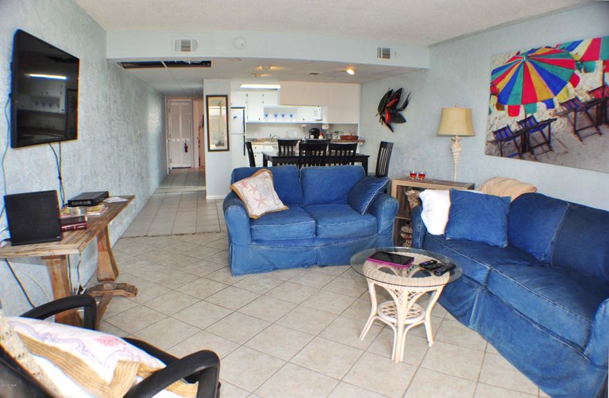 CURRENTLY UNDER CONTRACT, SELLER ACCEPTING BACKUP OFFERS.  Ground floor Sugar Beach condo next to the pond, community room and pool! You're only a few steps to the beach from this 1BR/1BA unit. The unit is being sold furnished with all appliances conveying including the washer and dryer. This is an end unit with a covered patio off the back and a private courtyard off the side. All tile flooring and the outside AC was replaced in 2016. Sugar Beach is a waterfront complex with a dedicated beach, tennis courts, courtyard ponds with fountains, barbecue grill and picnic area, a community room and a pool.   All info is approx. and must be verified by Buyers if important.