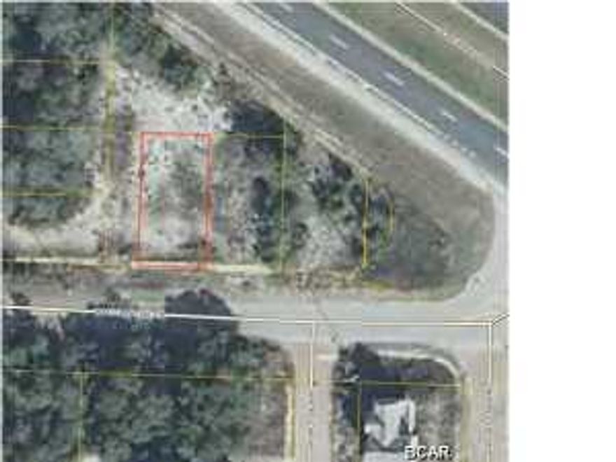 Vacant residential lot on Walton Rose Ln off US HWY 98. Ready for a builder or investor. Located just inside Walton County after crossing Phillips Inlet Bridge heading west. Pier Park is approximately 9 miles to the east. Lot has improvements on it with sidewalk on Walton Rose Lane front side of the lot. Water meter cans, electrical transformer, and what appears to be a storm water drain and sewer manhole. Buyers should contact Walton County Planning and Development Services department to inquire about status of development orders, permits, on site utilities and tap fees required. The lot is approximately 0.2 mile or 4 minute leisurely walk down Walton Rose Lane, left and down Wall Street to the nearest public beach access on the Gulf of Mexico.