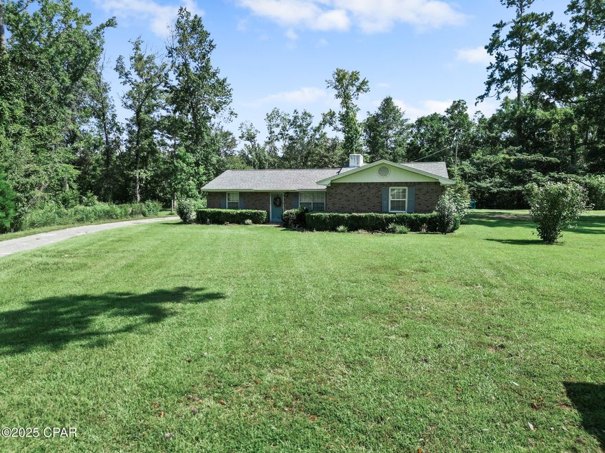 !!Price Improvement!!

Welcome to 8372 NW River Road in the Estiffanulga community of Bristol, Florida!

This solid 1990 brick home is approximately 1,720 square feet and sits on about 2.8 acres, with around 1.94 acres almost completely fenced in. Offering 3 bedrooms, 2 full baths, and everything you need to enjoy life in the Florida Panhandle.

The property overlooks Outside Lake, with steps leading down to the water, perfect for fishing, relaxing, or simply enjoying the view.

Whether you're relaxing under the two-car carport, pulling into the paved circle driveway, or working on hobbies in the enclosed 3-bay shed, this home is full of possibilities.

One of the bays features the start of an outdoor kitchen, complete with a large sink, just waiting for your personal touch to become the perfect spot for weekend cookouts or fish fries.

Love the outdoors? You're less than 2 miles from the Apalachicola River public boat ramp and just a short drive to the Apalachicola National Forest—perfect for fishing, boating, hiking, and making new memories in nature.

With room to roam and space to grow, this home offers the lifestyle you've been looking for—comfort, privacy, and outdoor adventure.

Schedule your showing today and come see how this home can be the perfect fit for your next chapter!