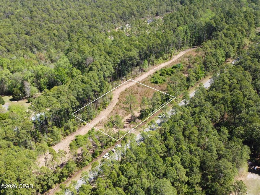Build your dream home on this 0.82-acre lot tucked away just off Highway 331 in a convenient and fast-growing area of Freeport. This homesite offers a more private setting while still keeping you close to everything that makes the Emerald Coast so desirable.

Located near the 331 bridge, you'll be just 20 minutes from Grayton Beach and only 7 minutes from The Shoppes at Freeport for shopping, dining, and everyday convenience.

Whether you're looking to build a primary residence, second home, or investment property, this is a great opportunity to secure land in a location with strong upside and easy access to both the beach and town.

- NO MOBILE HOMES PERMITTED.
- HOUSE PLANS AVAILABLE WITH BUILDER!