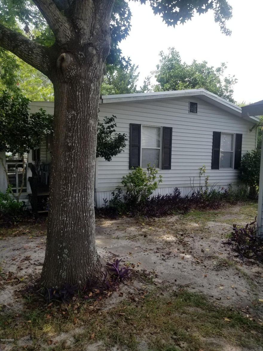 A ''MUST SEE'' home. Looking for that relaxing atmosphere with only a short walk to the beach? This is it! Completely furnished and with an unbelievable price too!